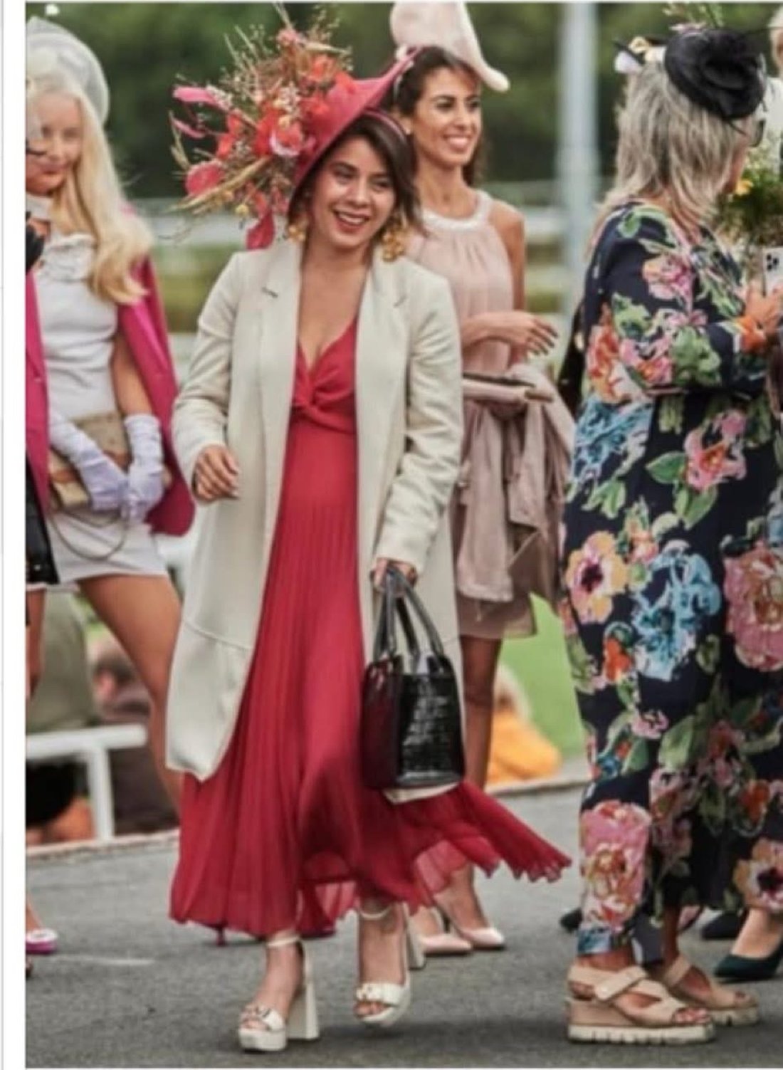 Valeria Hacket in a red dress at an event